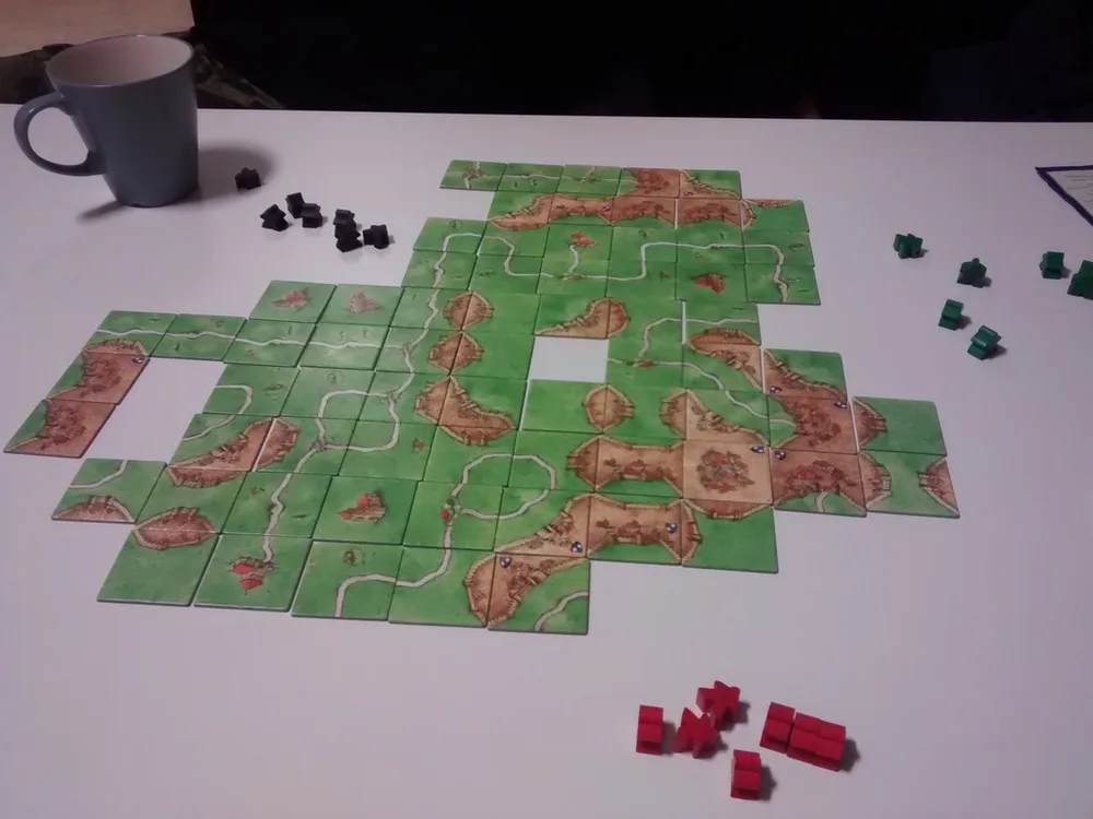 A completed game of Carcassonne on a table